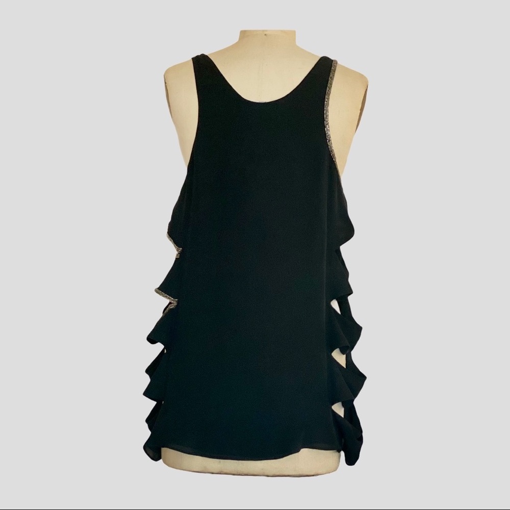 Max Azria sexy top. Lined with beading accents
